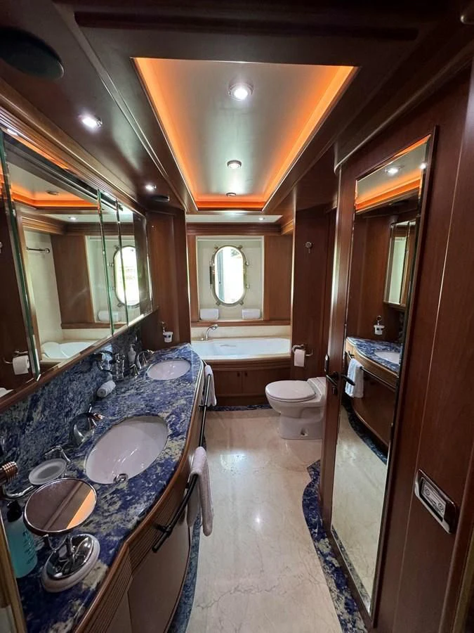 a bathroom with a sink and toilet aboard AZIMUT 100/32 Yacht for Sale