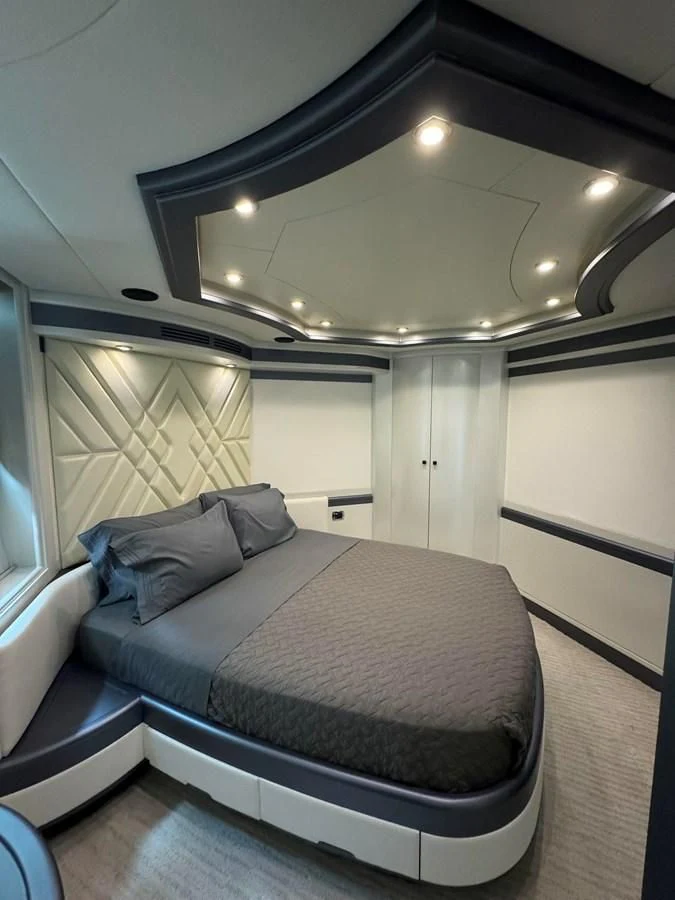 a bed in a room aboard AZIMUT 100/32 Yacht for Sale