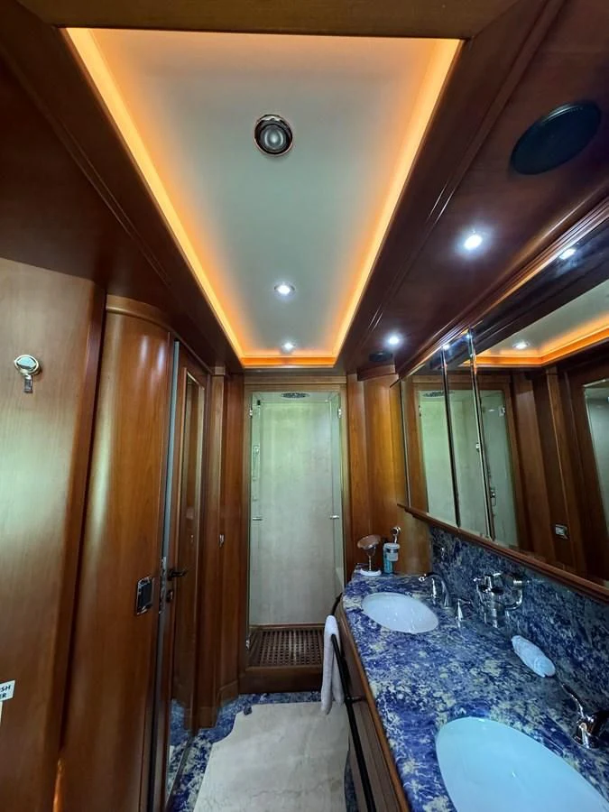 a bathroom with a large marble sink aboard AZIMUT 100/32 Yacht for Sale