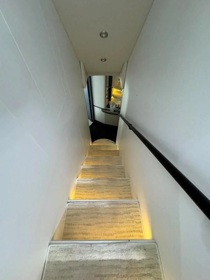 a hallway with a carpet aboard AZIMUT 100/32 Yacht for Sale