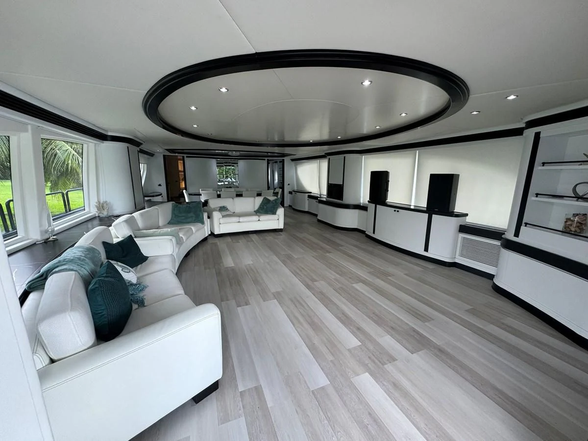 a living room with a large ceiling aboard AZIMUT 100/32 Yacht for Sale