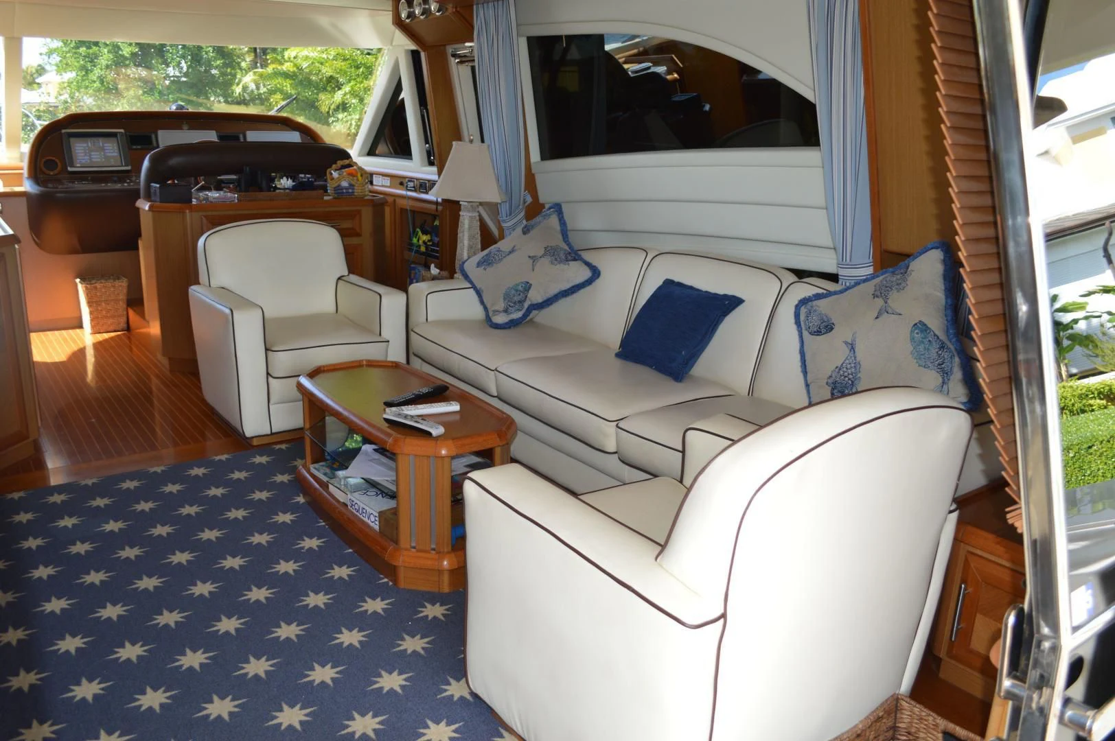 a living room with a couch and a table aboard KNOT NANNY'S Yacht for Sale