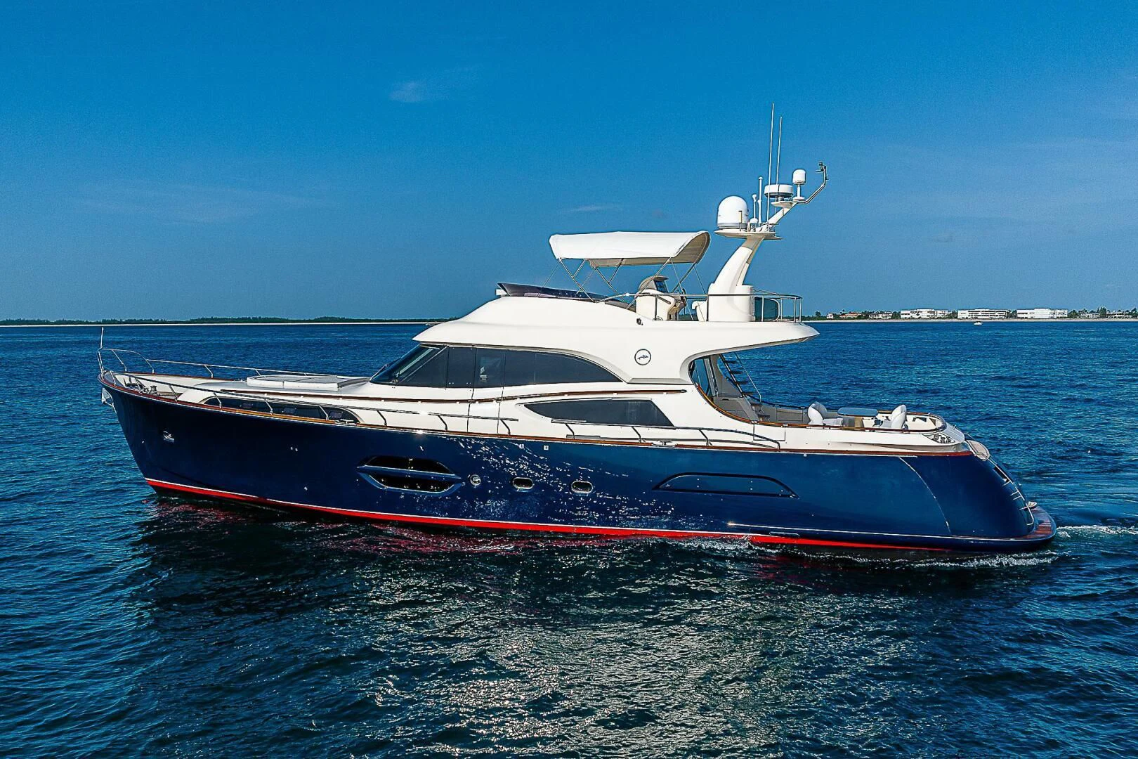a large boat in the water aboard KNOT NANNY'S Yacht for Sale