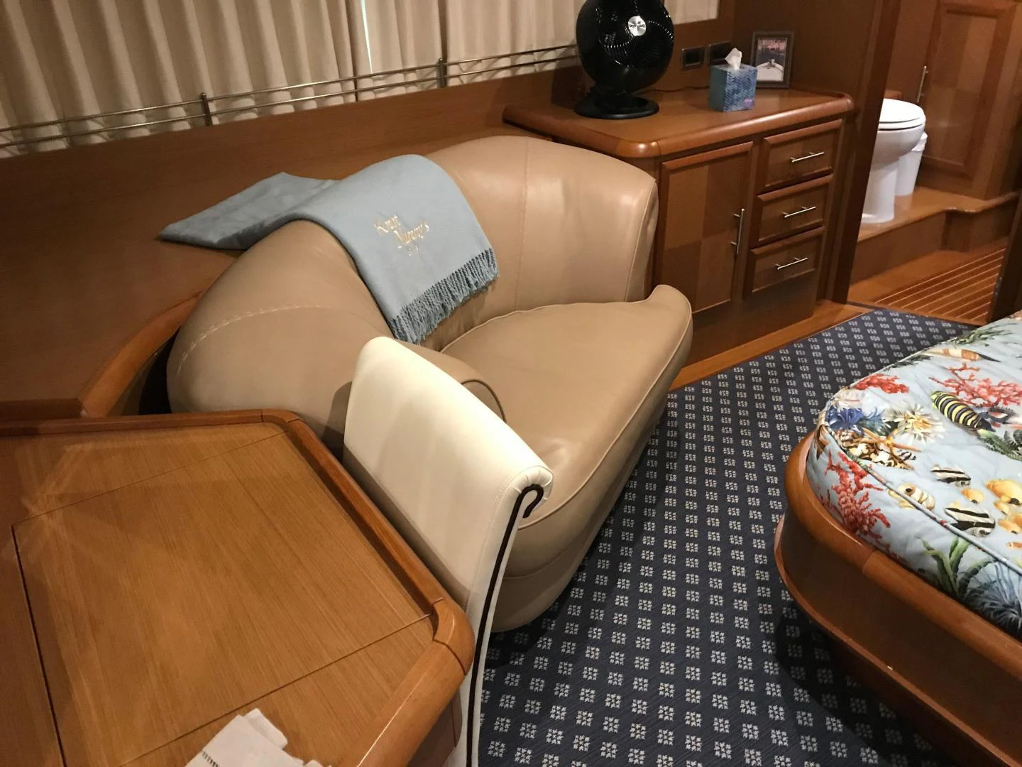 a couch in a room aboard KNOT NANNY'S Yacht for Sale