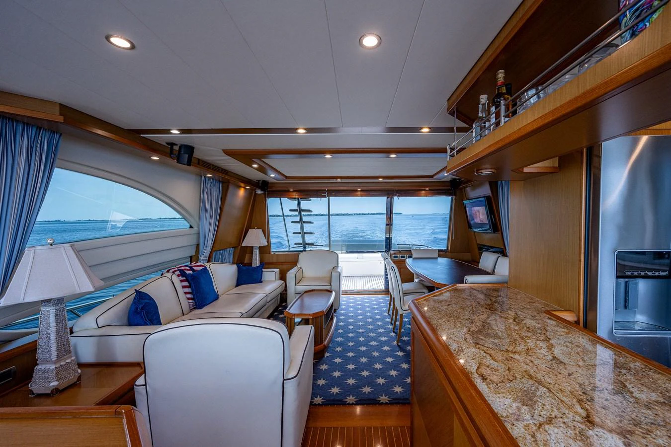 a large living room with a large window aboard KNOT NANNY'S Yacht for Sale