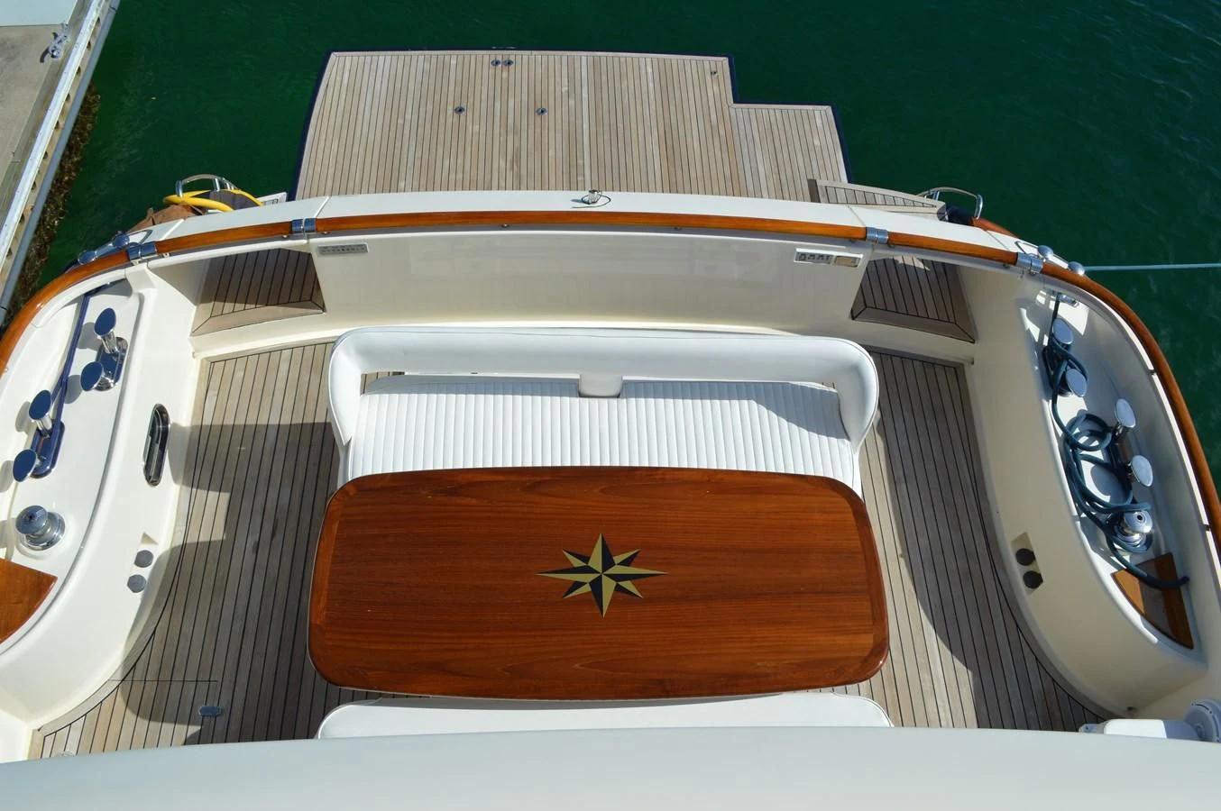 a white and orange striped sports car aboard KNOT NANNY'S Yacht for Sale