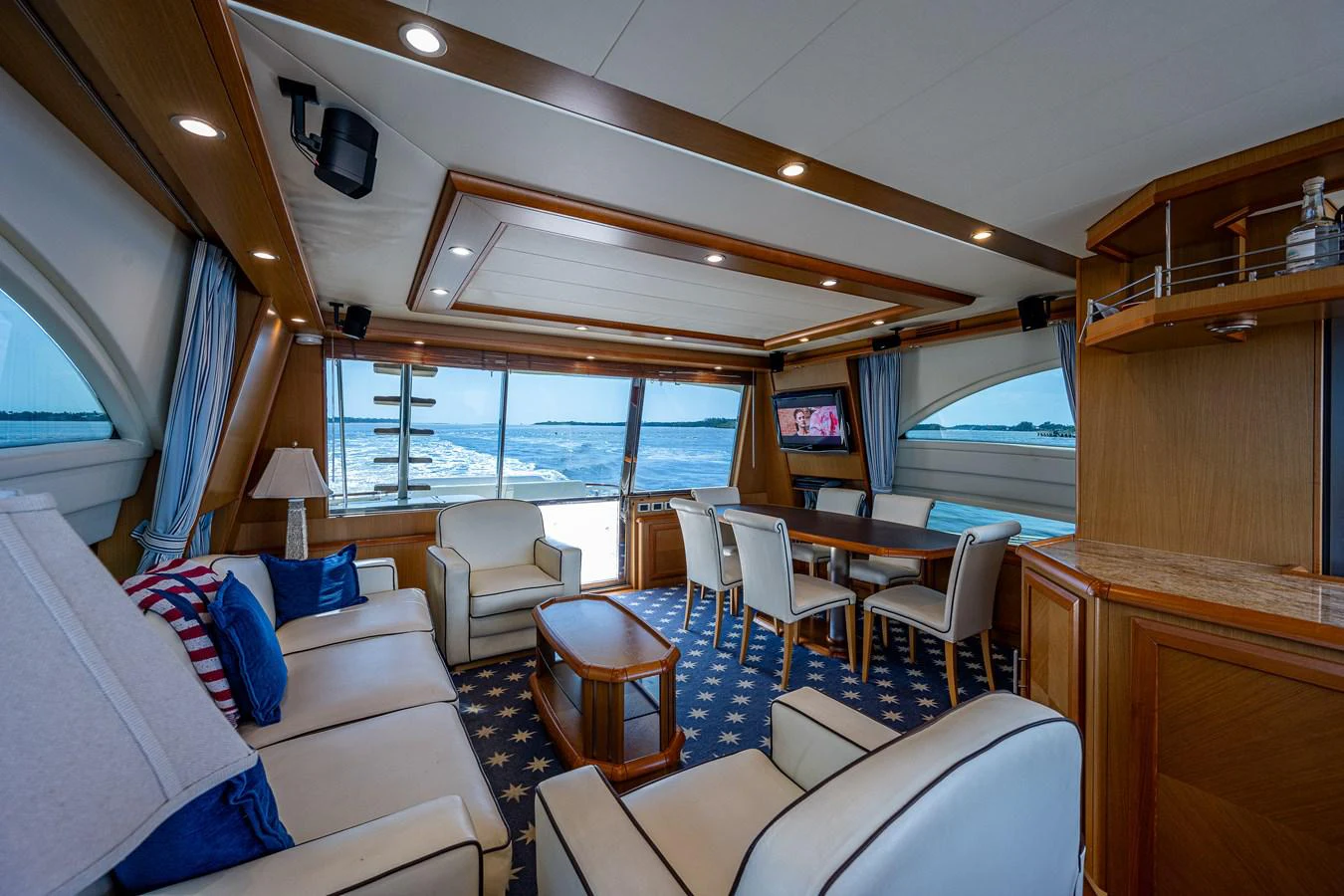 a room with a couch and a table and chairs aboard KNOT NANNY'S Yacht for Sale