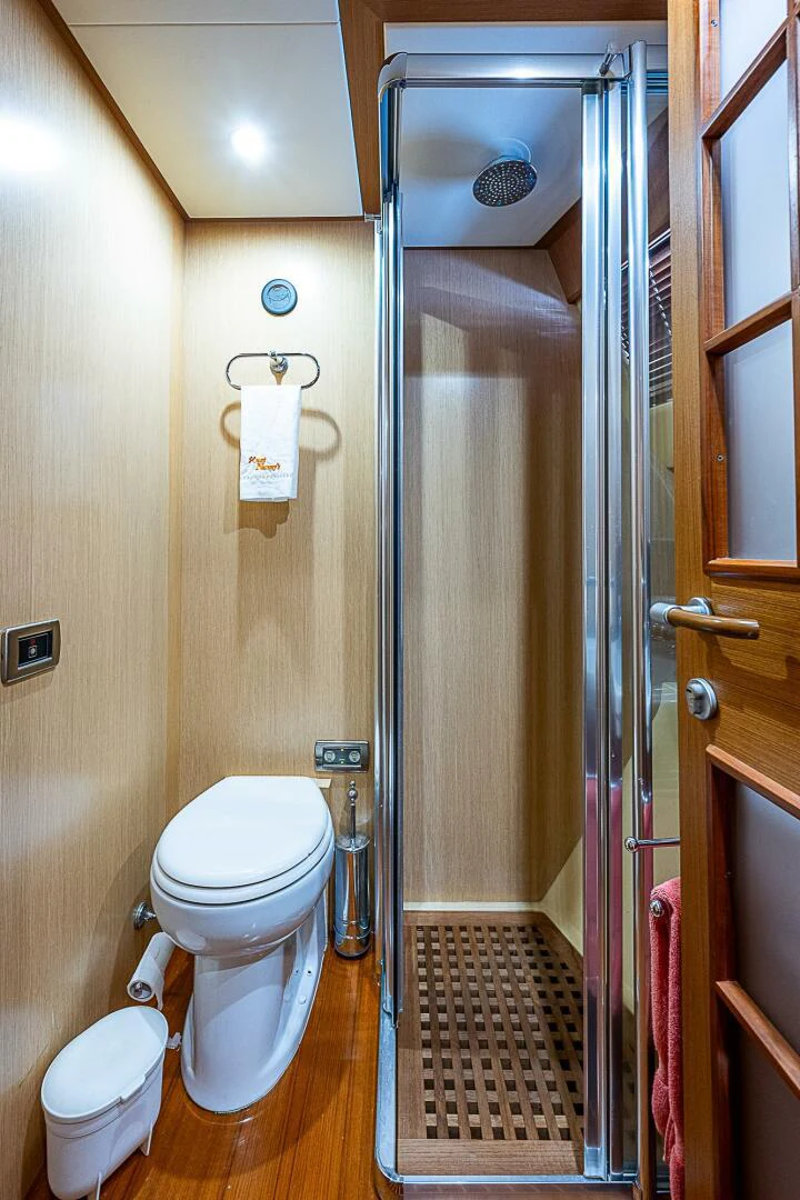 a bathroom with a toilet and a sink aboard KNOT NANNY'S Yacht for Sale
