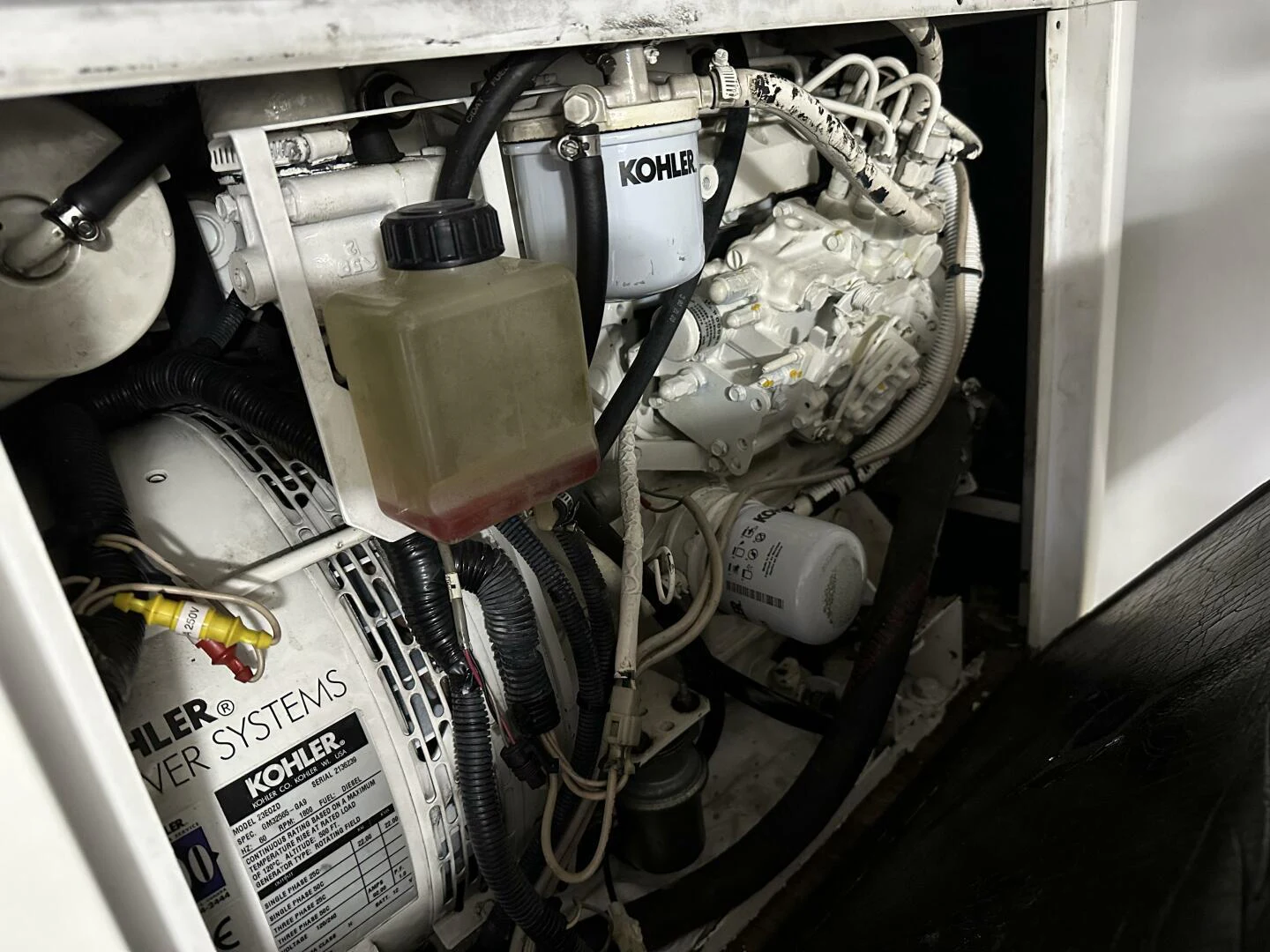 a car engine with a hood aboard KNOT NANNY'S Yacht for Sale