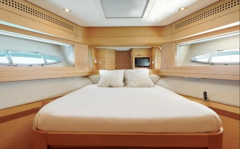 a bed in a room aboard WAHOO Yacht for Sale