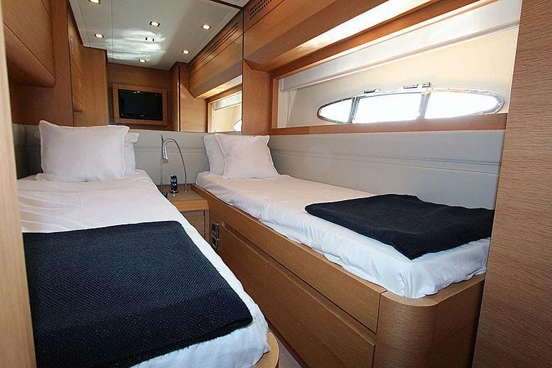 a room with two beds aboard WAHOO Yacht for Sale