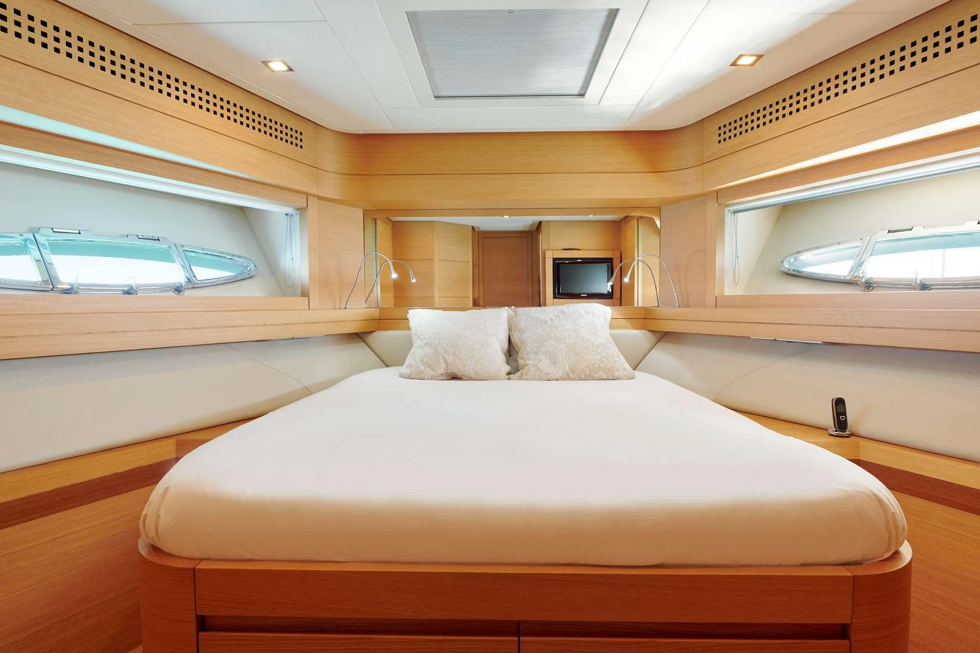 a bed in a room aboard WAHOO Yacht for Sale
