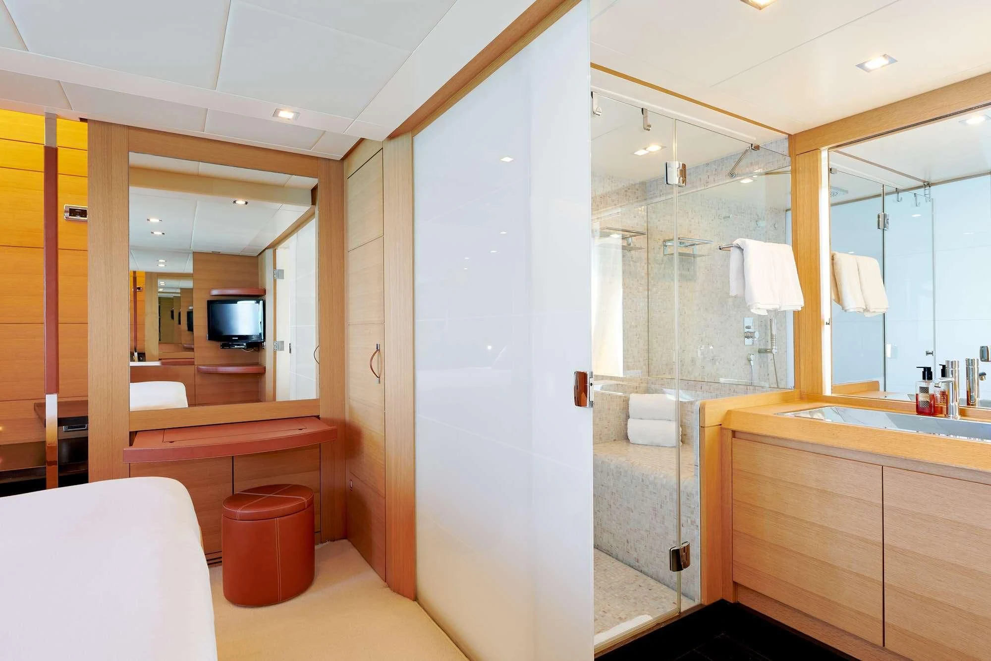 a bathroom with a shower and a sink aboard WAHOO Yacht for Sale