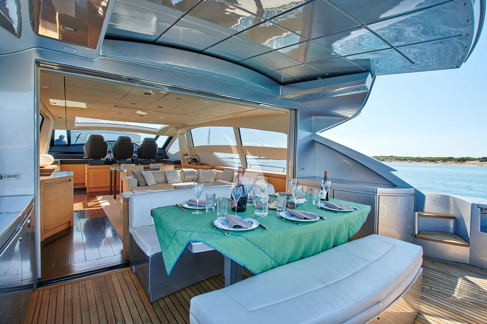 a table with glasses on it aboard WAHOO Yacht for Sale