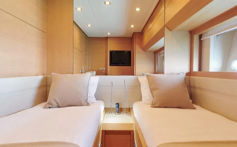 a room with couches and a television aboard WAHOO Yacht for Sale