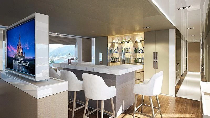 a room with a table and chairs aboard HARMONY Yacht for Sale