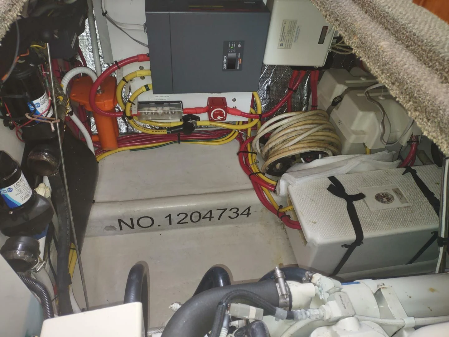 a machine with wires and electrical equipment aboard UNWINED Yacht for Charter