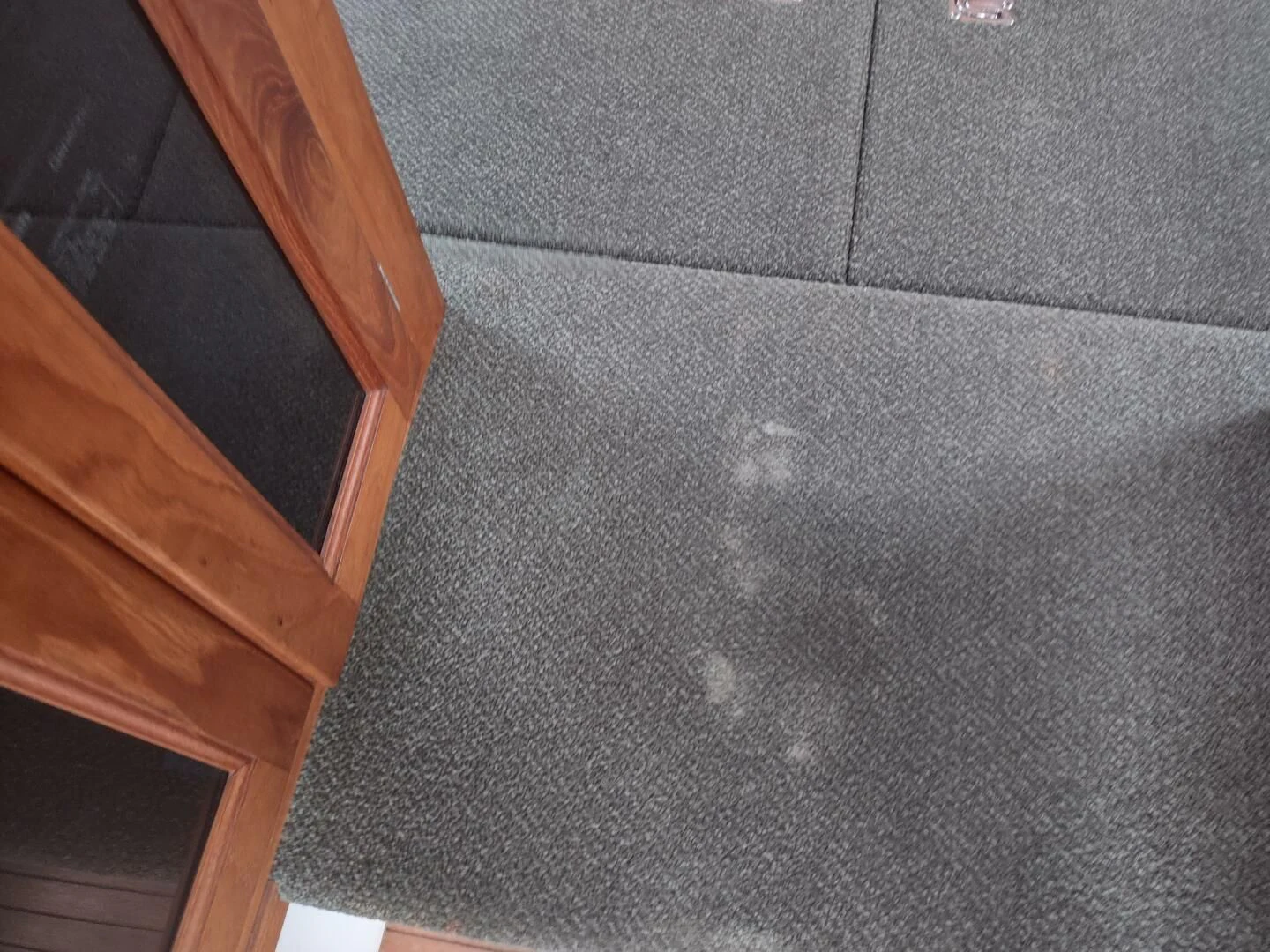 a close-up of a grey floor aboard UNWINED Yacht for Charter
