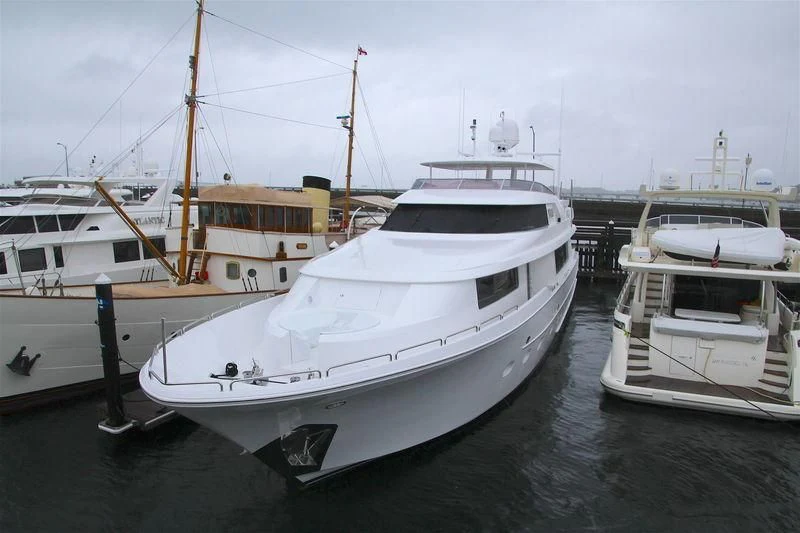 several boats docked at a pier aboard UNWINED Yacht for Charter