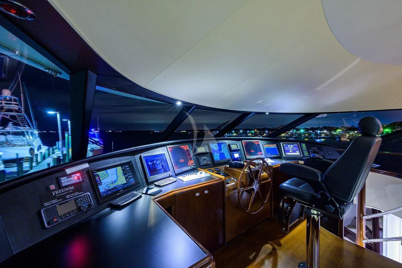 inside of a vehicle with many screens aboard UNWINED Yacht for Charter