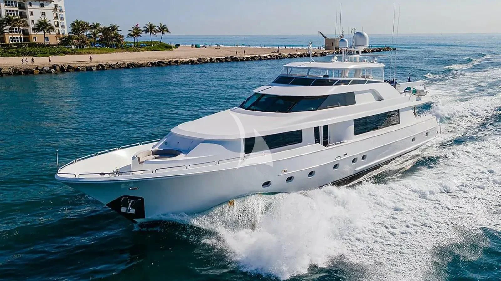 a white yacht on the water aboard UNWINED Yacht for Charter