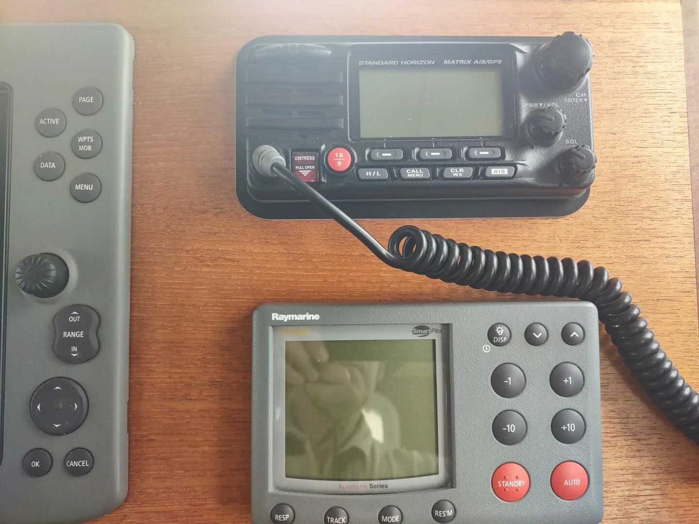 a video game console and a game controller aboard UNWINED Yacht for Charter