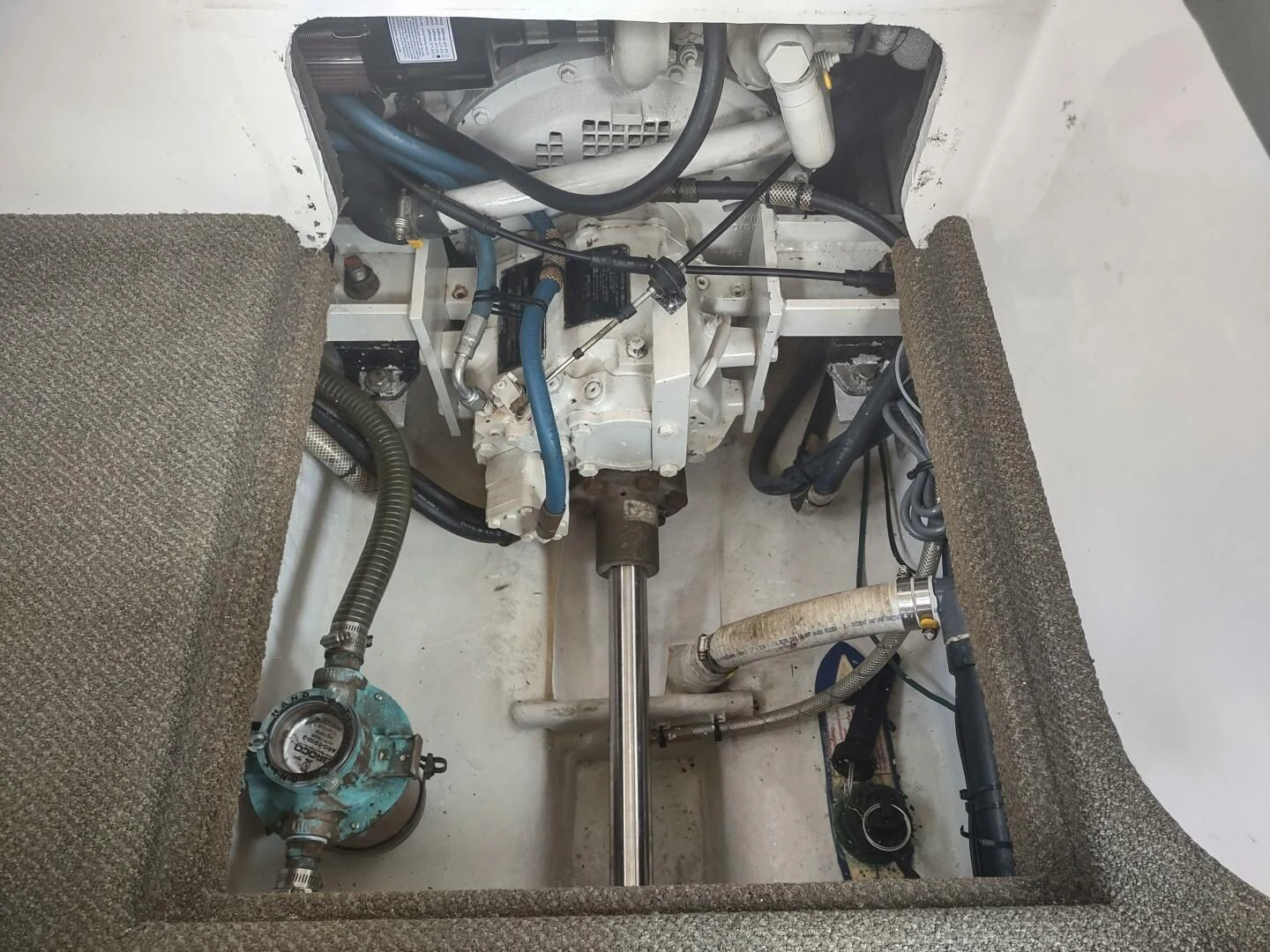 a car engine with wires aboard UNWINED Yacht for Charter