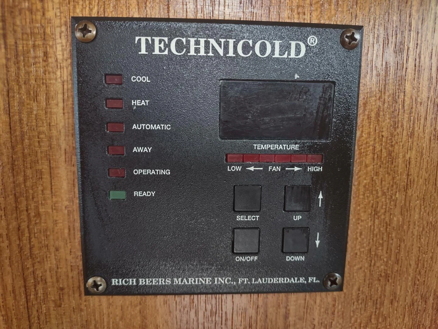 a black rectangular electronic device aboard UNWINED Yacht for Charter