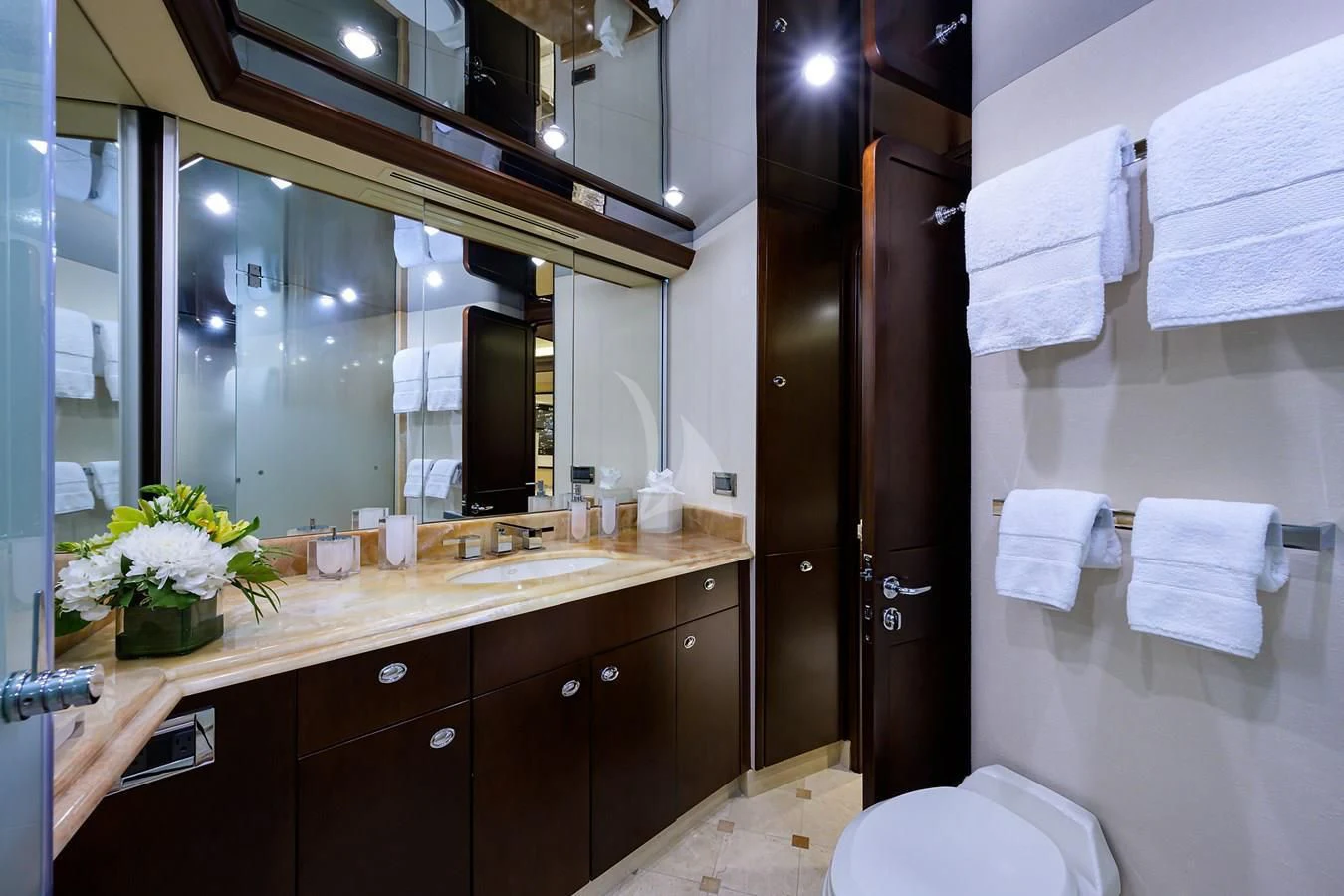 a bathroom with a large mirror aboard UNWINED Yacht for Charter