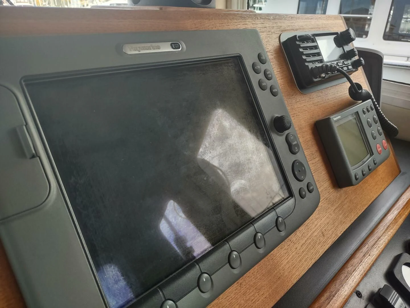 a television on a table aboard UNWINED Yacht for Charter