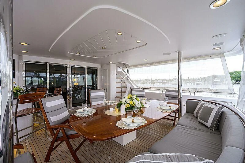 a living room with a large window aboard UNWINED Yacht for Charter