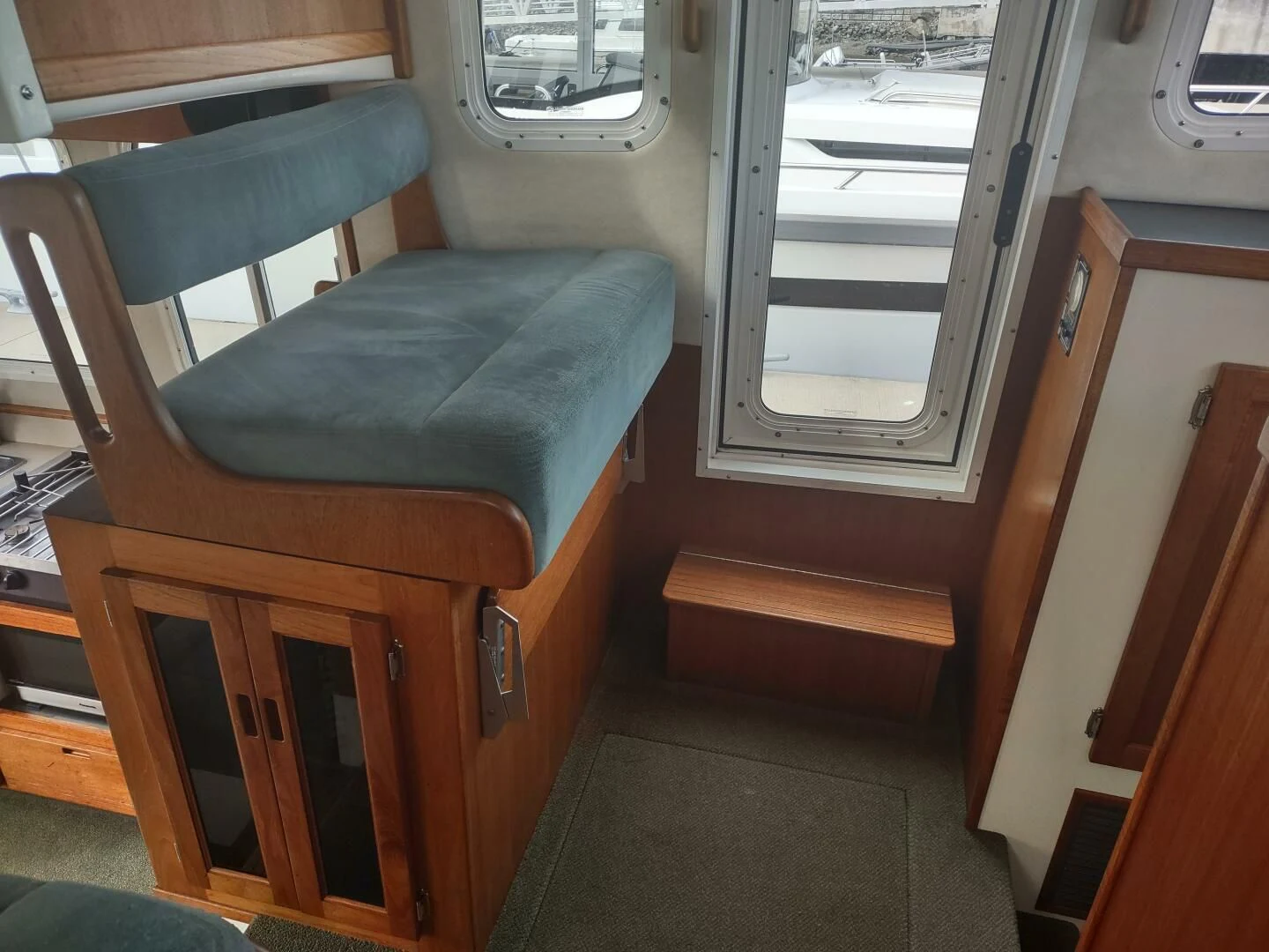 a seat on a bus aboard UNWINED Yacht for Charter