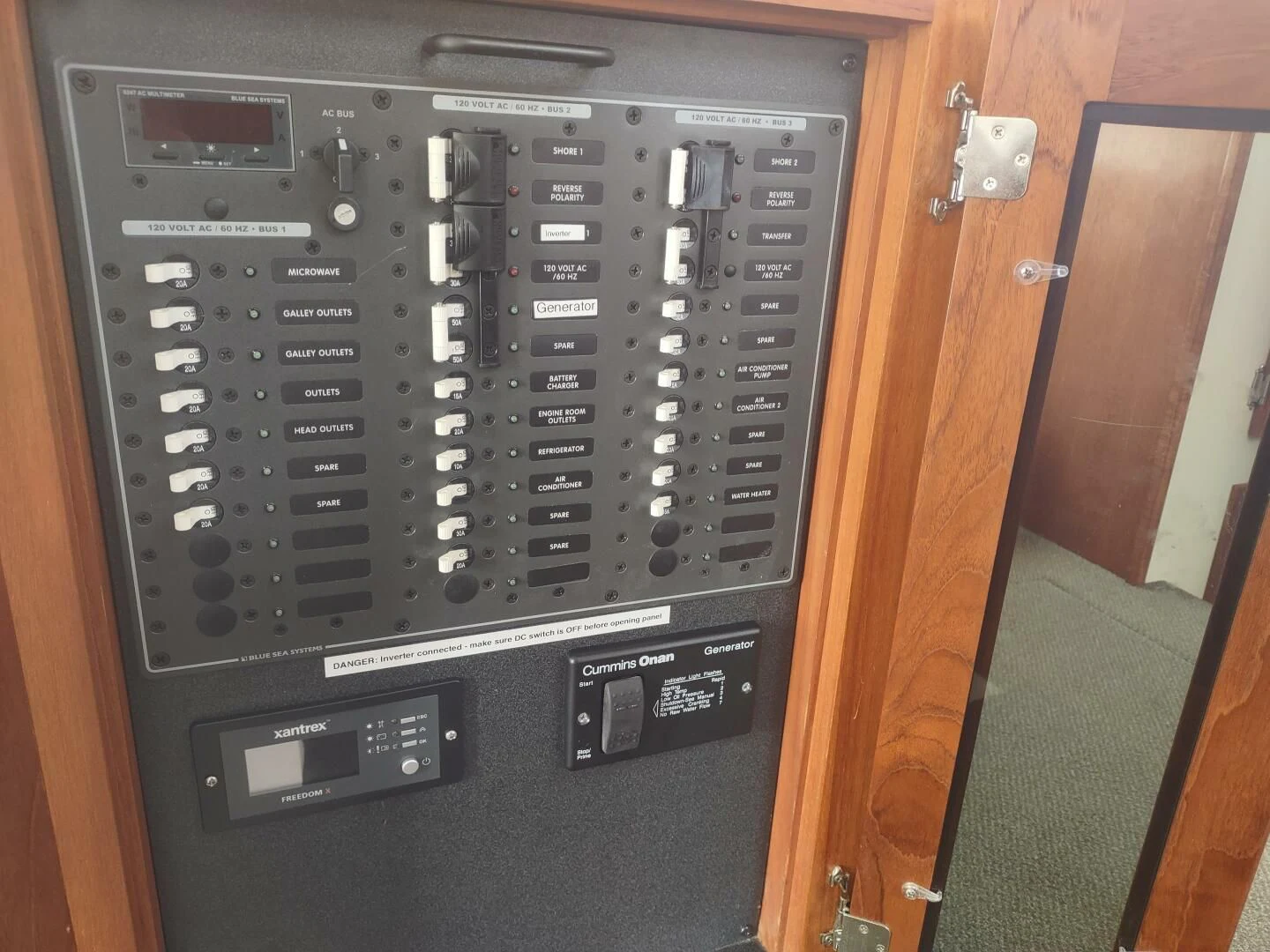 a black computer tower aboard UNWINED Yacht for Charter