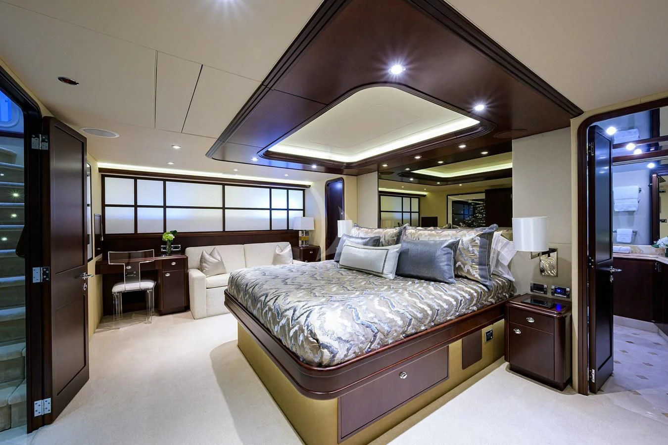 a large bedroom with a large bed aboard UNWINED Yacht for Charter