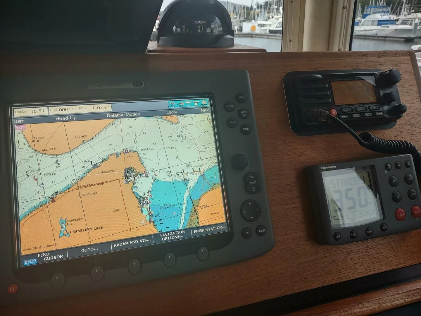 a video game console and remote control aboard UNWINED Yacht for Charter