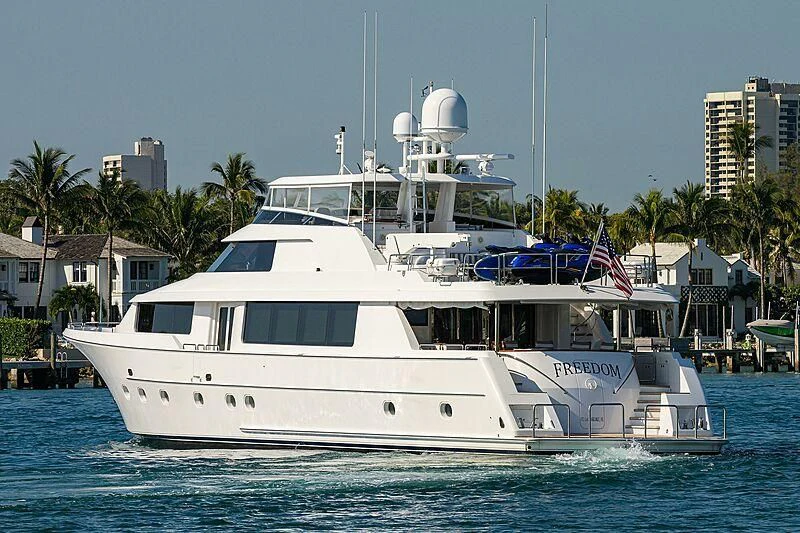 a large white boat in the water aboard UNWINED Yacht for Charter