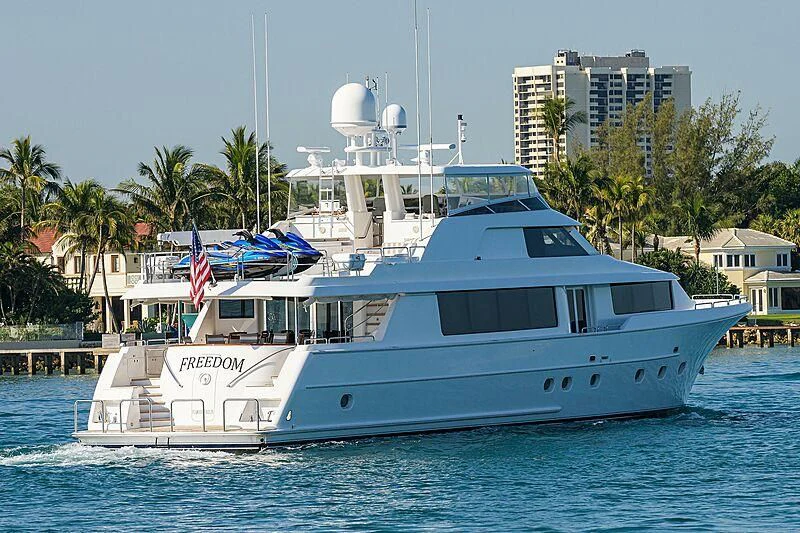 a large white boat on the water aboard UNWINED Yacht for Charter