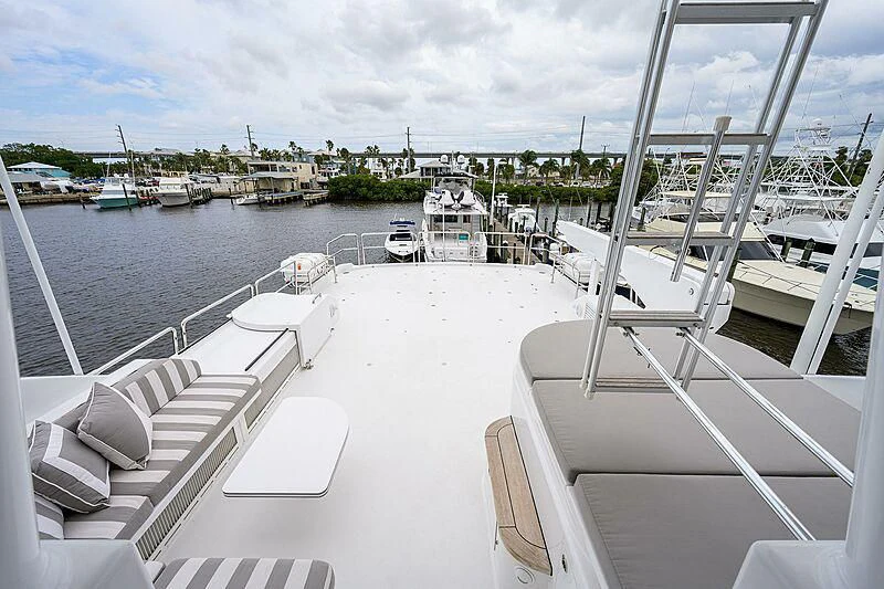 a boat dock with boats aboard UNWINED Yacht for Charter