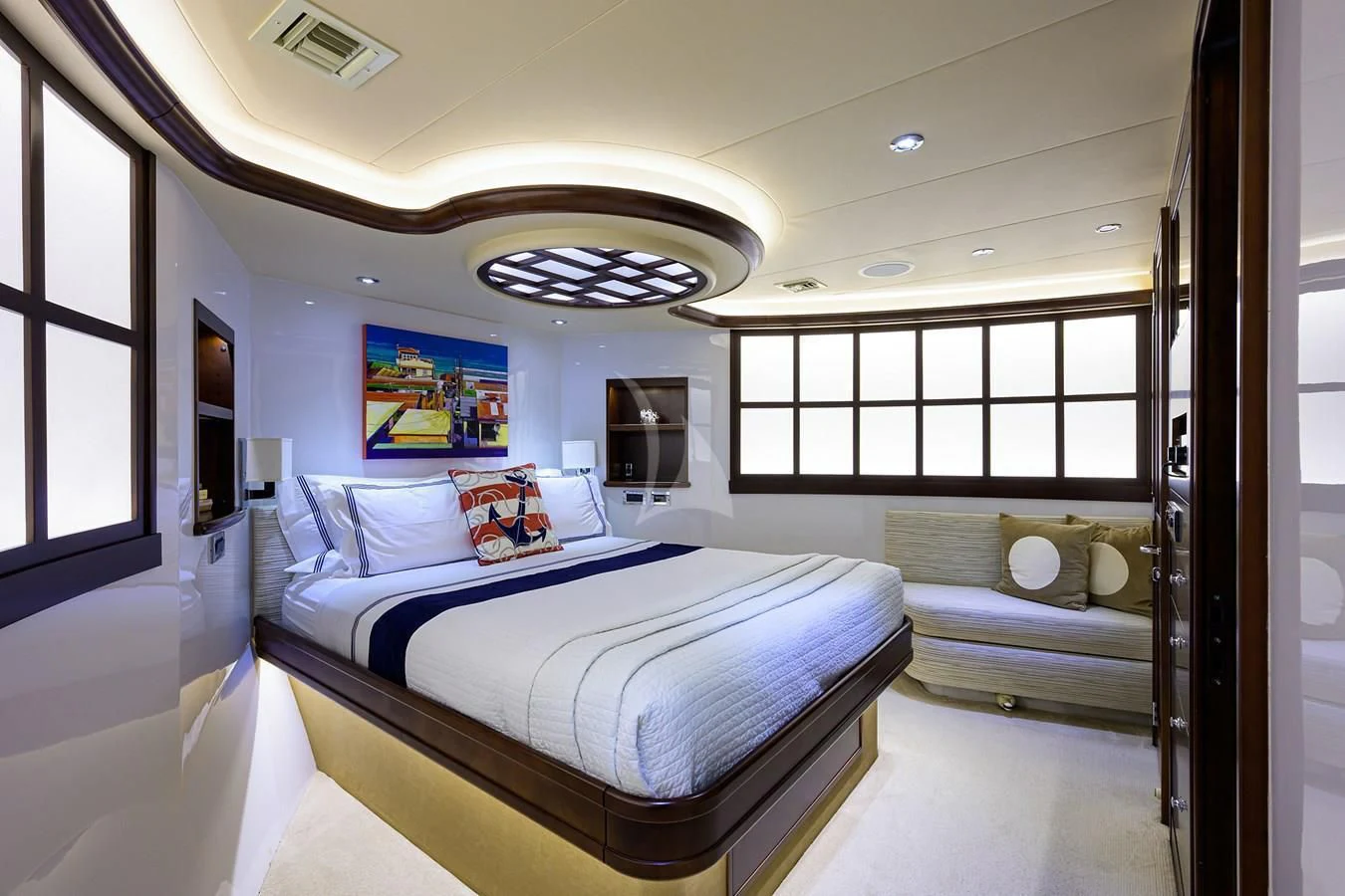 a room with a bed and a window aboard UNWINED Yacht for Charter