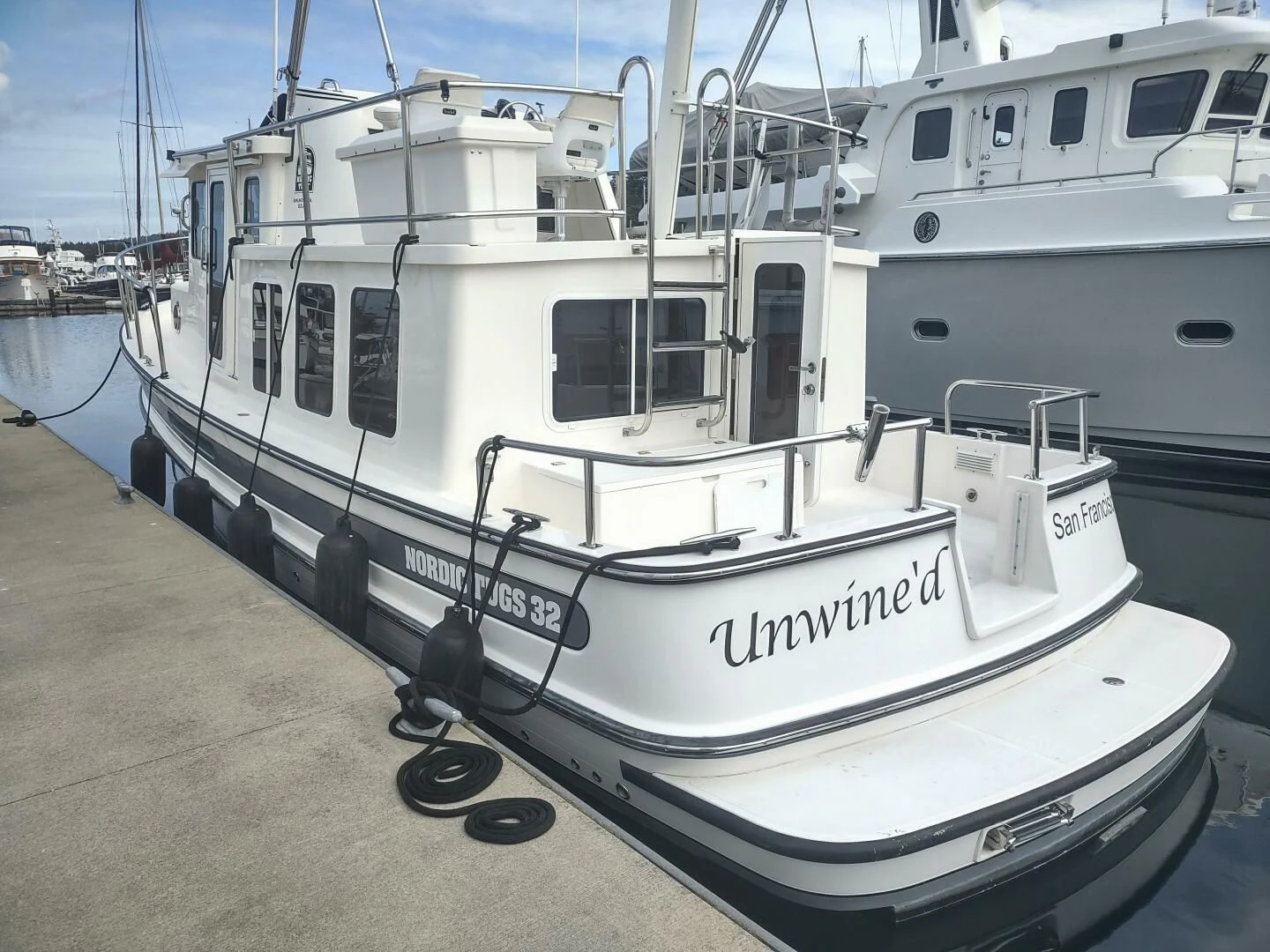 a row of boats docked aboard UNWINED Yacht for Charter