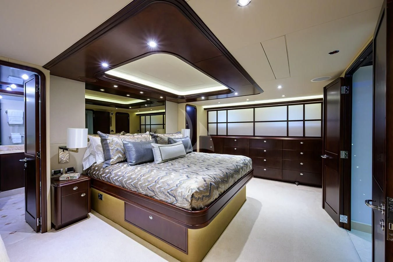 a large bedroom with a large bed aboard UNWINED Yacht for Charter