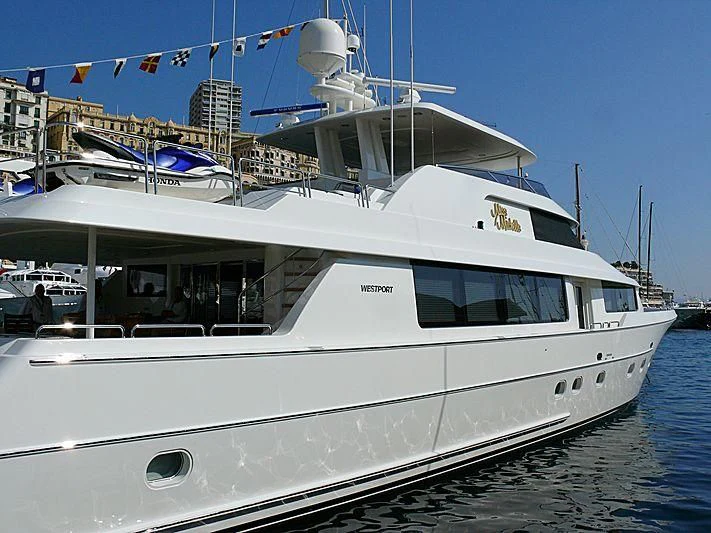 a white boat docked aboard UNWINED Yacht for Charter