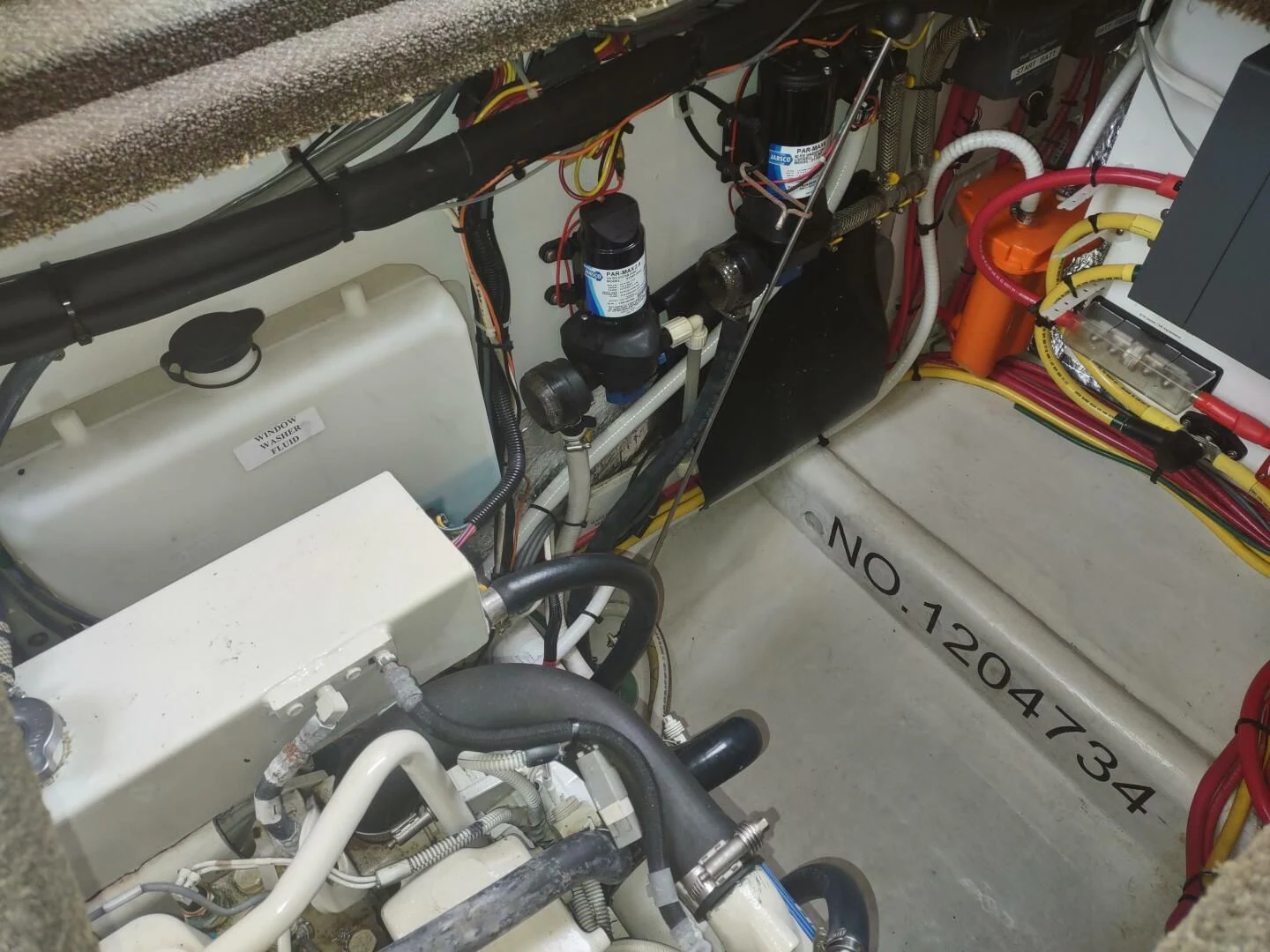 a car with wires and a car aboard UNWINED Yacht for Charter