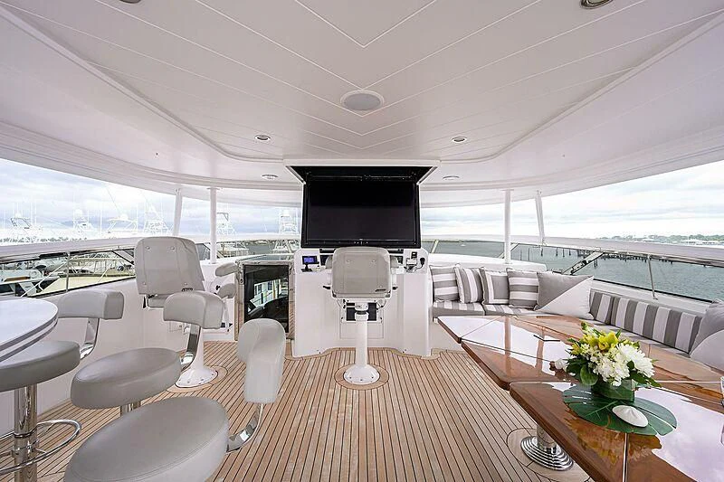 a room with a table and chairs aboard UNWINED Yacht for Charter