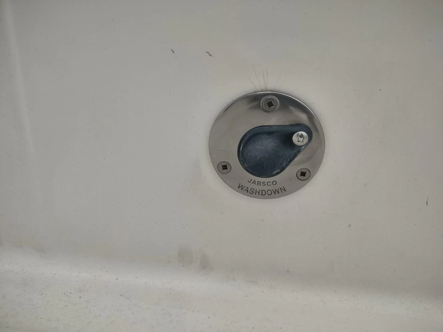 a white object with a hole in it aboard UNWINED Yacht for Charter