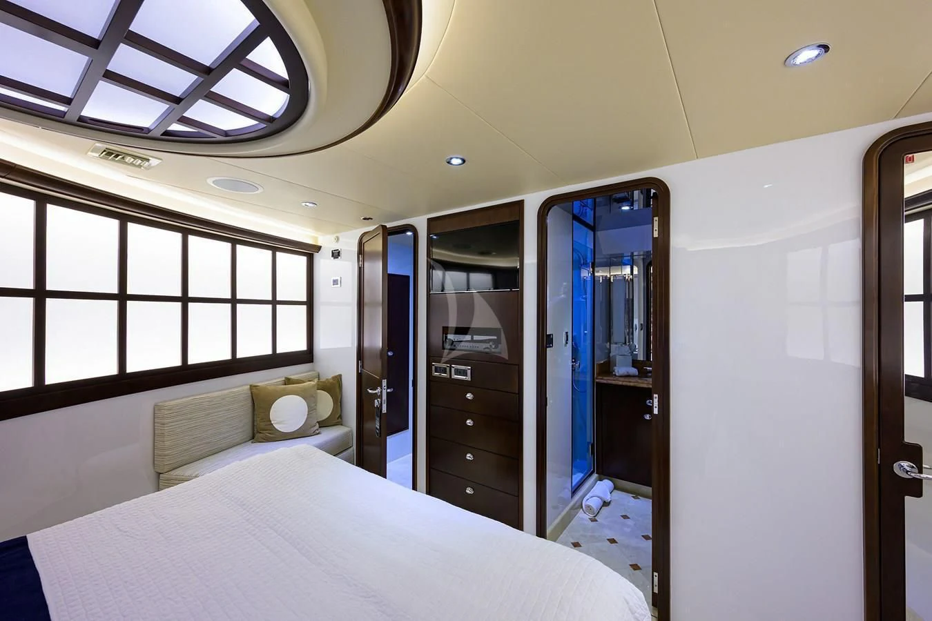 a room with a bed and a window aboard UNWINED Yacht for Charter
