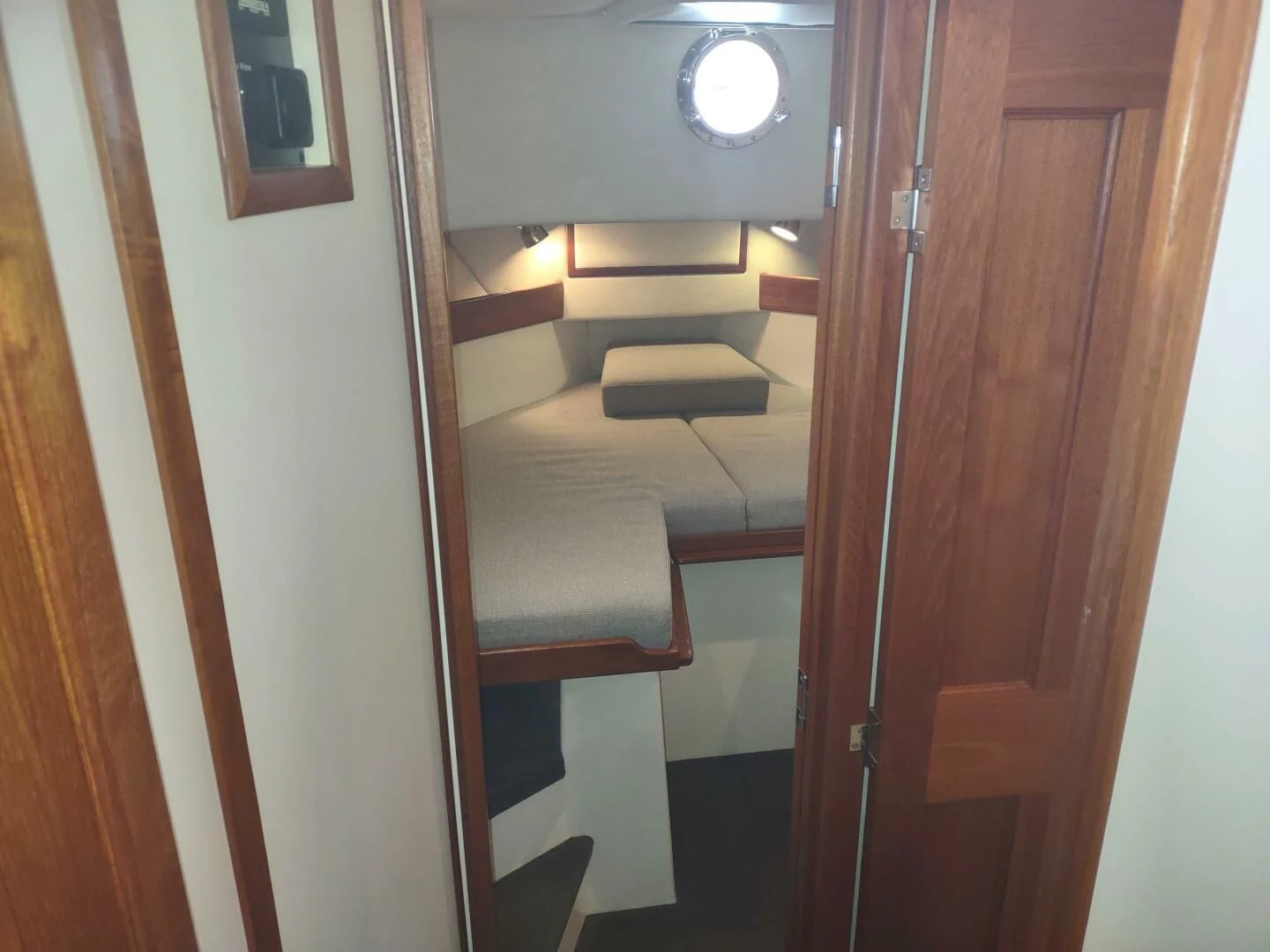 a room with a row of seats aboard UNWINED Yacht for Charter