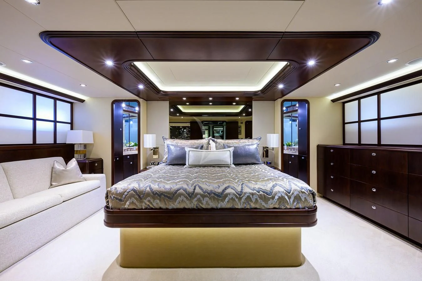 a large bedroom with a large bed aboard UNWINED Yacht for Charter