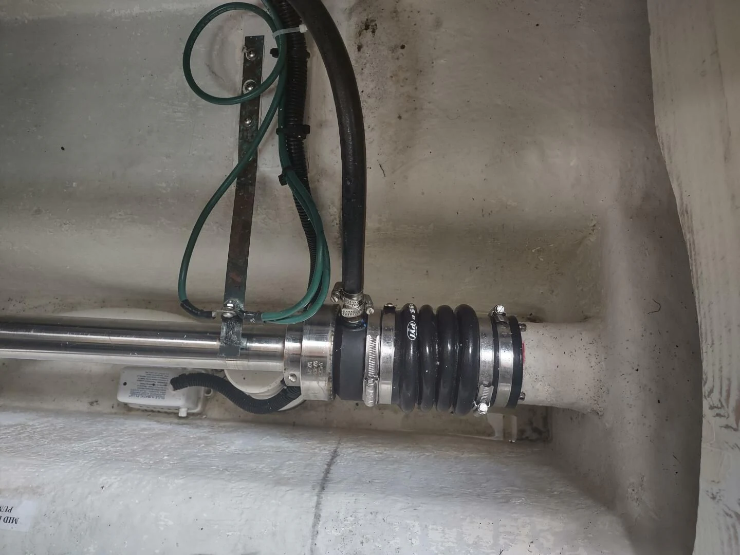 a green and black pipe aboard UNWINED Yacht for Charter