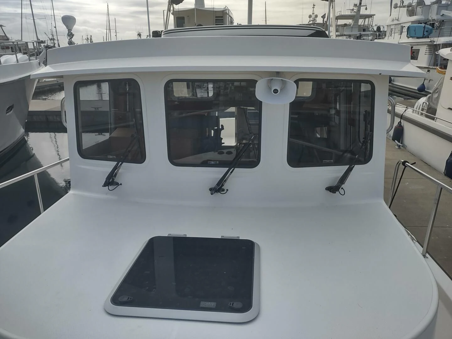 a white helicopter with a black screen aboard UNWINED Yacht for Charter